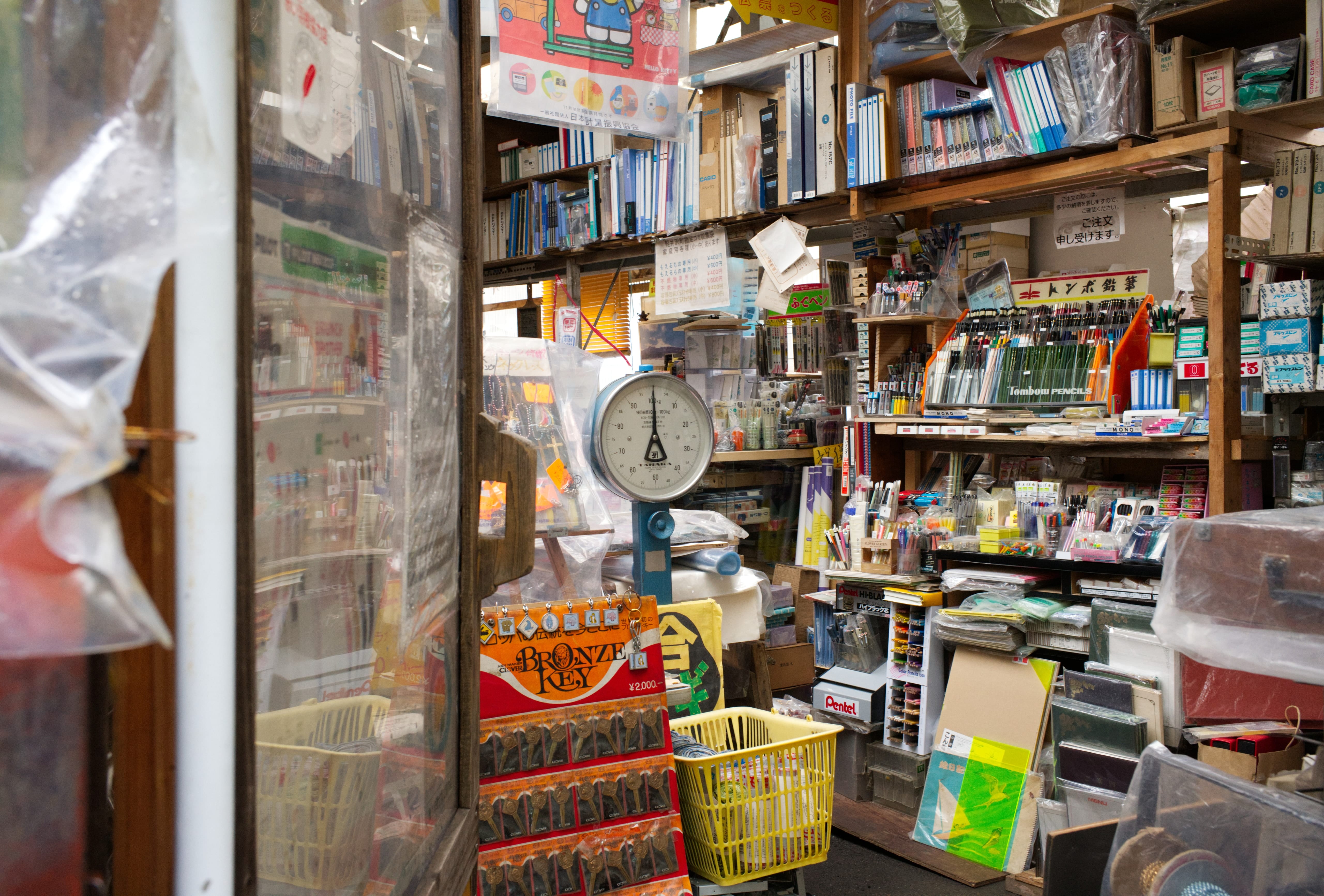 Shelves of pens, binders, and paper inside an old stationery store in Karuizawa