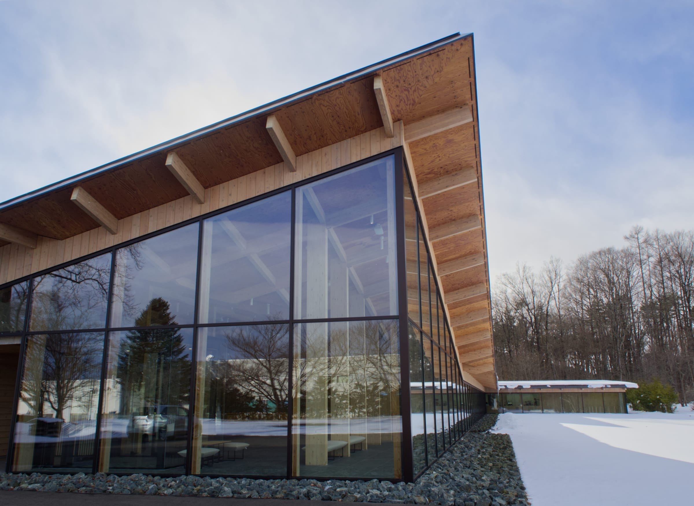 Exterior of the studio building beneath an open sky