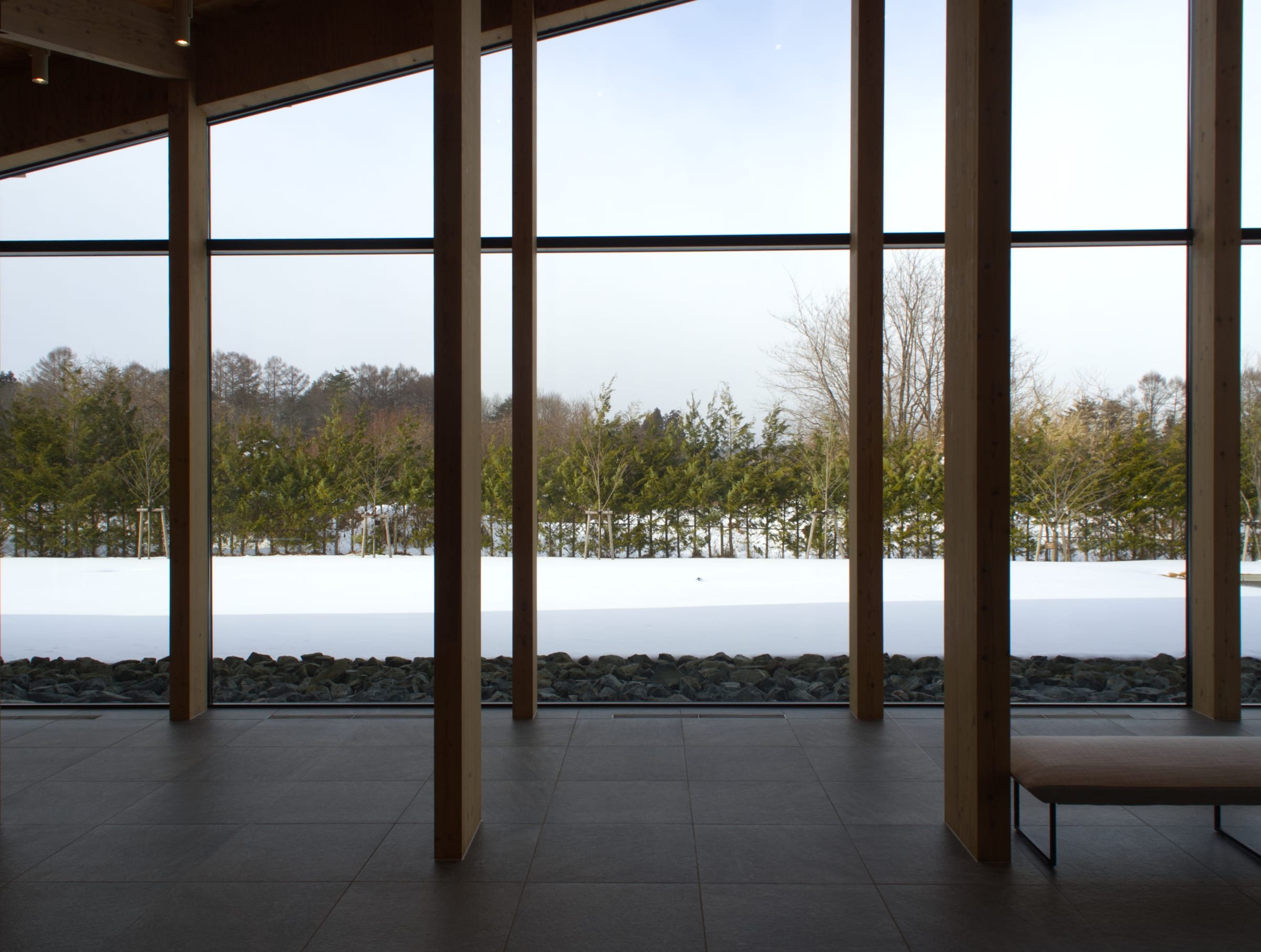 Lobby windows looking out on snowy grounds