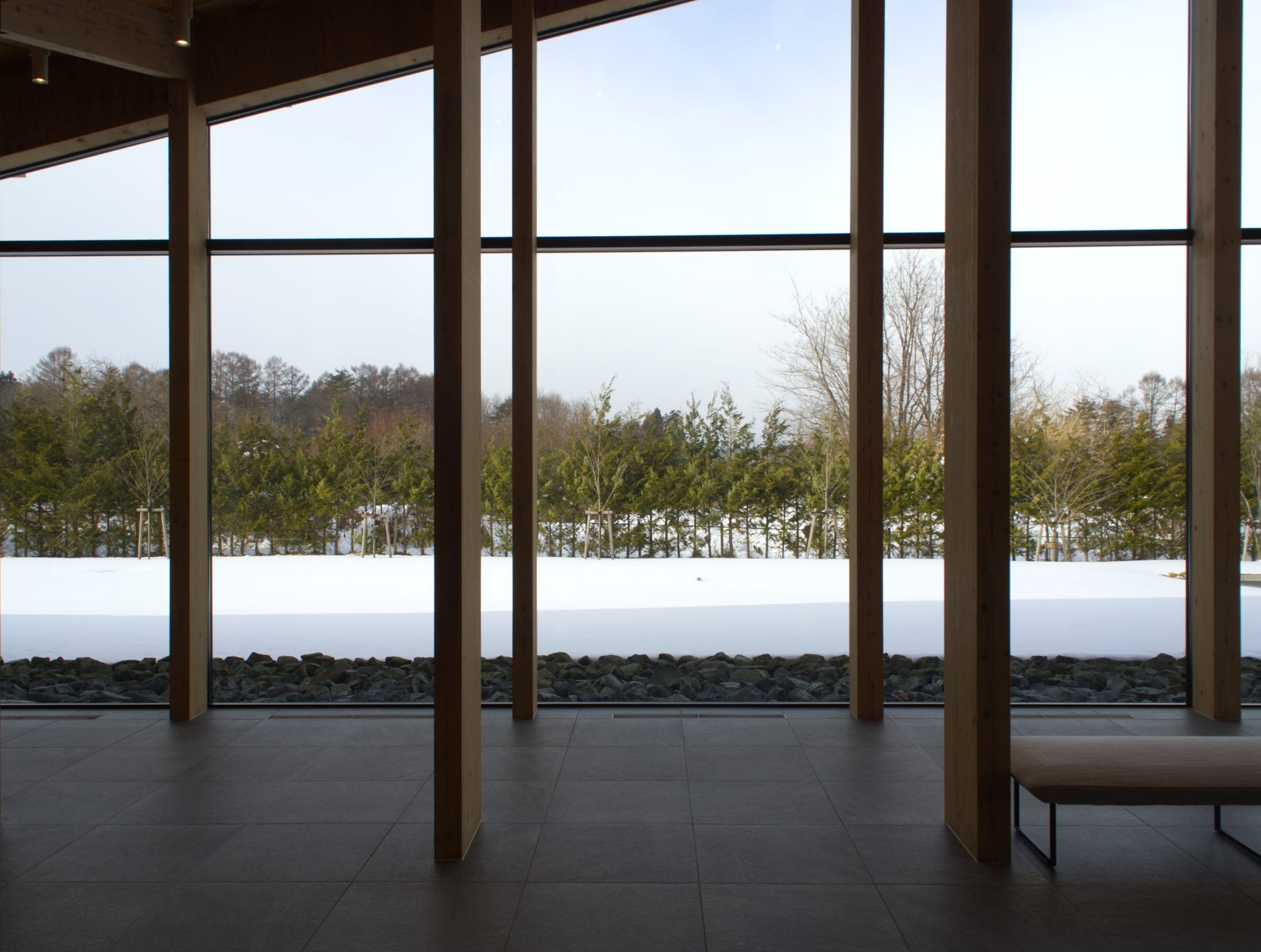 Lobby windows looking out on snowy grounds